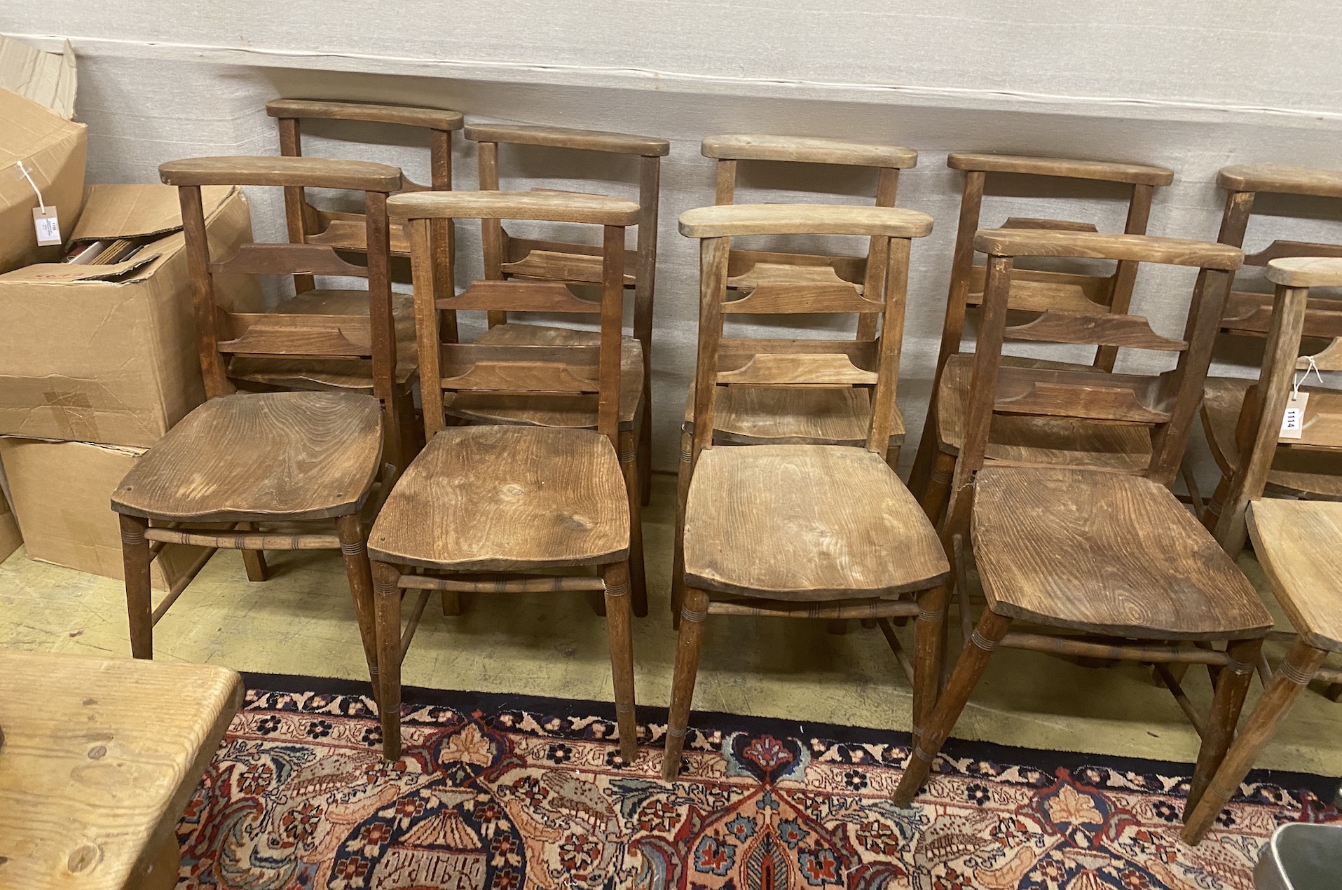 A set of ten elm and beech chapel chairs, width 37cm, depth 36cm, height 80cm